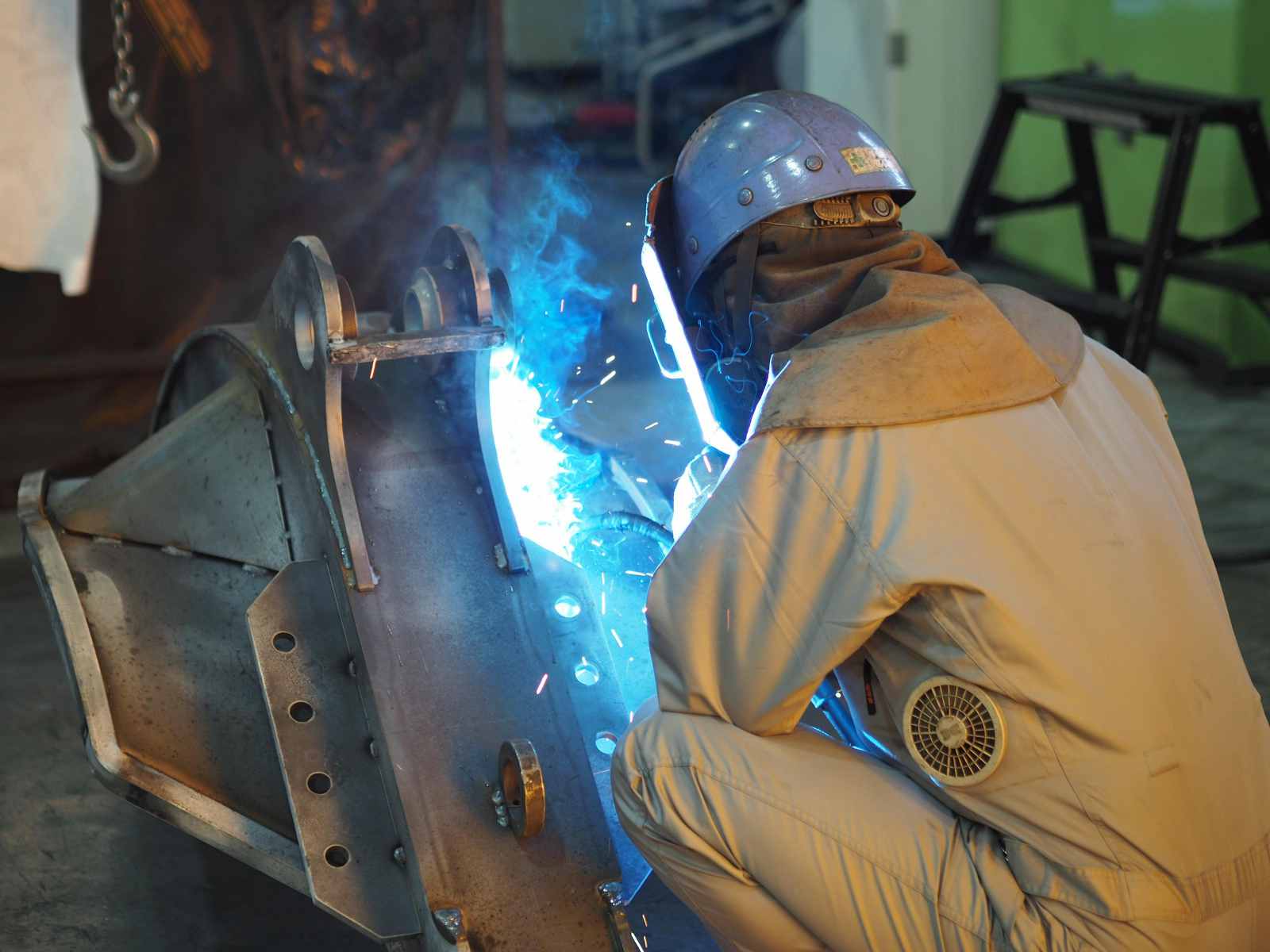 Heavy equipment attachment welding process