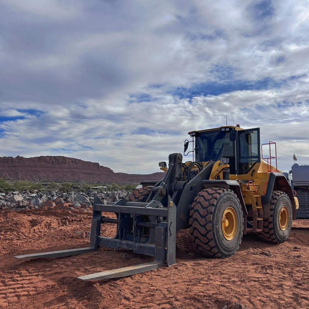 Sibom Industry wheel loader and skid steer attachments on job site